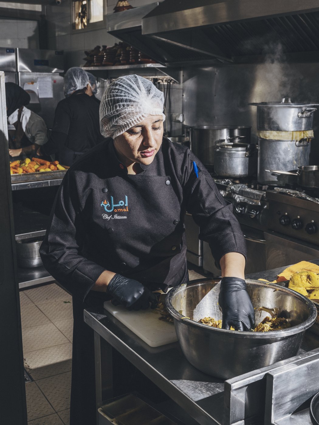 An Amal chef at work in the kitchen