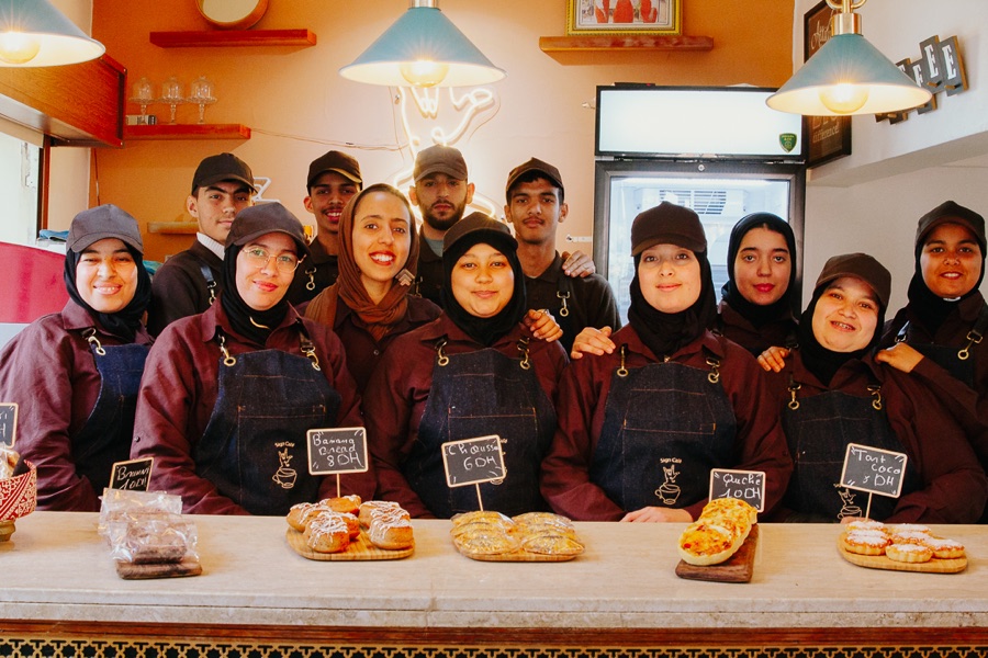 The Sign Café deaf team behind the counter
